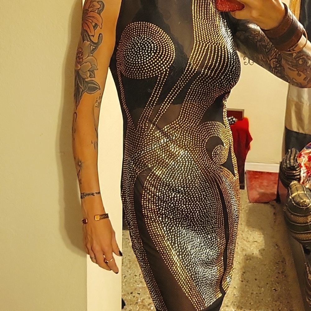 JLo see through sequin dress